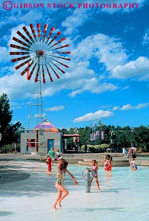 Stock Photo #12121: keywords - alberta calgary canada children claire district eau fun in park parks people play playing pool pools recreation refresh refreshing season summer swim vert water waterpark wet
