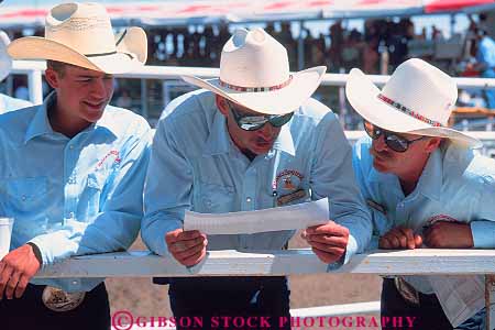 Stock Photo #12137: keywords - activity alberta annual calgary canada costume costumes cowboy cowboys event events fair fairs festival festivals gathering hat hats horz men program read rodeo social stampede white
