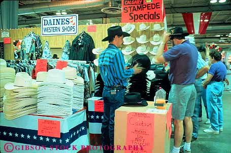 Stock Photo #12139: keywords - activity alberta annual calgary canada clothes clothing cowboy customer customers event events fair fairs festival festivals for gathering hat hats horz man men shop shopper shoppers shopping social stampede store stores