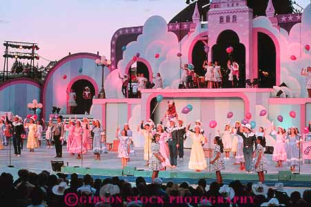 Stock Photo #12140: keywords - activity alberta annual calgary canada canadians dark drama dramatic dusk entertain entertainer entertainers entertainment evening event events fair fairs festival festivals gathering horz lighting music musical night outdoor outside perform performance performer performers performing show showing shows social stage stampede young
