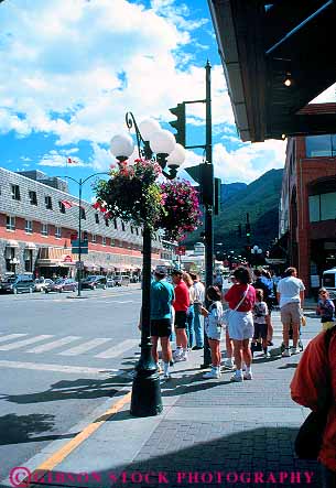 Stock Photo #12079: keywords -  alberta banff business canada destination district downtown mountains pedestrian people road roads rocky store stores street streets town towns travel vert