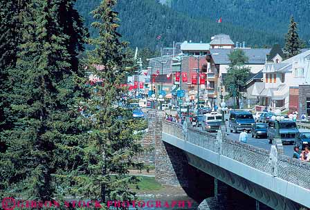 Stock Photo #12080: keywords - alberta banff bow bridge business canada congestion destination district downtown horz mountains over river rocky town towns traffic travel