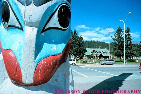 Stock Photo #12087: keywords - alberta canada craft crafted destination horz jasper mountains national park parks pole poles public rocky street streets totem travel