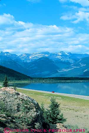Stock Photo #12088: keywords -  alberta canada car cars country destination highway highways jasper lake lakes landscape landscapes mountain mountains national park parks public red rocky route routes rural scenery scenic street streets travel vehicle vert