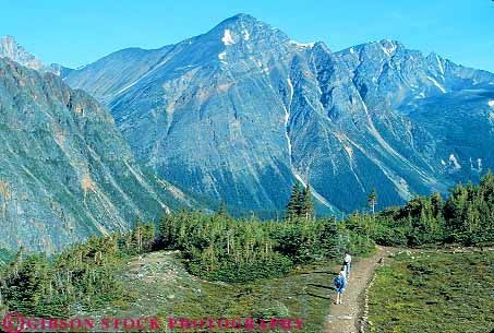 Stock Photo #12090: keywords -  alberta canada cavell destination explore exploring hike hiker hikers hiking horz in jasper meadow mountain mountains national outdoor outside park parks people public recreation rocky trail trails travel walk walking