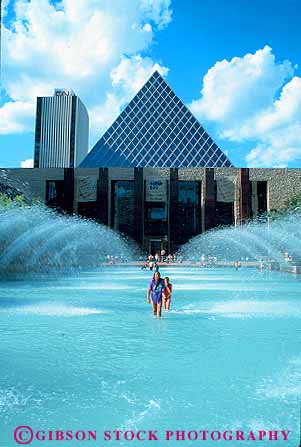 Stock Photo #12515: keywords -  alberta angle angles architecture building buildings canada child children city diagonal diagonals edmonton fountain fountains hall halls in kid kids modern municipal play playing pool pools public pyramid pyramids right shape shapes style summer triangle triangles vert water