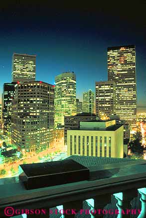 Stock Photo #12628: keywords - bright buildings center cities city cityscape cityscapes colorado commercial dark denver downtown dusk electricity elevate elevated evening lighting lights night office skyline skylines urban vert view