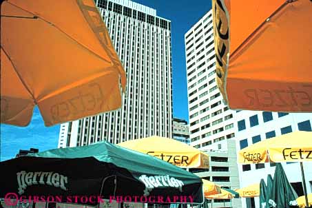 Stock Photo #11037: keywords -  buildings cafe cities city cityscape colorado colorful denver downtown horz metropolitan office umbrella umbrellas urban