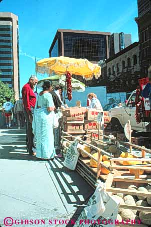 Stock Photo #11038: keywords -  cities city colorado couple crate crates denver display downtown farmers food foreign indian market markets people produce sale sales sell selling shop shopper shoppers shopping sidewalk stand streets urban vert