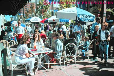 Stock Photo #11041: keywords -  cafe cafes cities city colorado crowd crowded denver dine dining downtown female friend friends group groups horz in larimer outdoor outside relax relaxed relaxing sidewalk social square summer sunny sunshine talk talking talks urban women