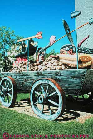 Stock Photo #11046: keywords -  art artistic cities city colorado denver downtown humor humorous museum museums outdoor sculpture sculptures urban vert wagon