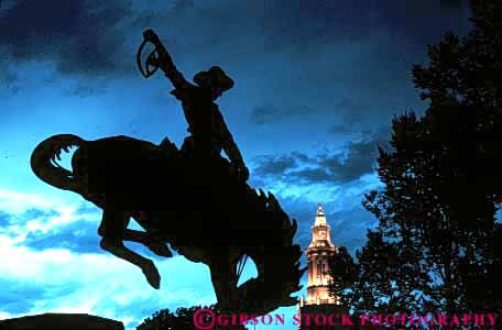 Stock Photo #11064: keywords -  center civic colorado cowboy dark denver dusk evening horz night silhouette silhouettes statue statues
