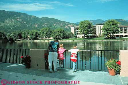 Stock Photo #12703: keywords -  broadmore child children city colorado horz hotel hotels lake mother mountain people pond resort resorts rocky springs summer