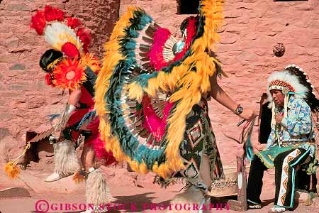 Stock Photo #18763: keywords -  american anasazi ancient cliff color colorado colorful colors costume costumed costumes cultural culture dance dancer dancers dances dancing demonstrate demonstrates demonstrating demonstration demonstrations dwelling feather feathers heritage historic historical horz indian manitou mountain mountains native old people perform performance performances performer performers performing performs person region rockies rocky ruin ruins site sites springs state tradition traditional