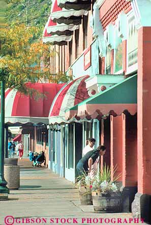 Stock Photo #18777: keywords -  brick business center colorado commercial couple district downtown durango mountain mountains old people person region rockies rocky shopper shoppers shopping state street tourist tourists town towns vert vintage west western window