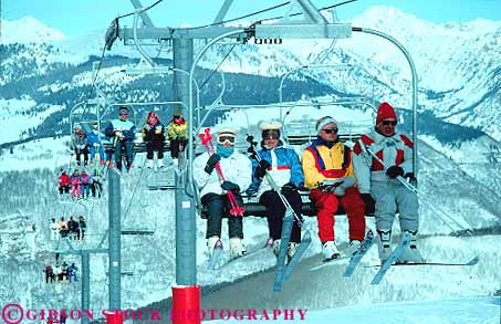 Stock Photo #11913: keywords -  cable carries carry carrying chair chill chilly cold colorado destination high horz lift lifts mountains outdoor outside quad recreation resort resorts ride riders riding rocky sit sits sitting ski skiers skiing snow speed sport sports transport transportation transports travel uphill vail winter