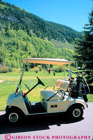 Stock Photo #12591: keywords - cart club colorado community course destination golf golfer golfers golfing men mountain mountains recreation resort resorts rocky sport summer town travel vail vehicle vert