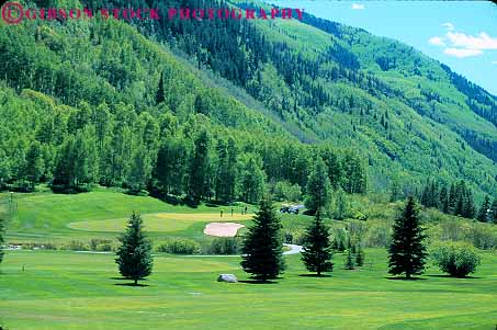 Stock Photo #12592: keywords - club colorado community course destination golf golfer golfers golfing horz mountain mountains people recreation resort resorts rocky sport summer town travel vail
