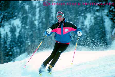 Stock Photo #11934: keywords - action aspen chill chilly cold colorado destination down downhill horz male man motion mountains move movement moving recreation resort resorts rocky season ski skiers skies skiing slope snow sport sports travel winter