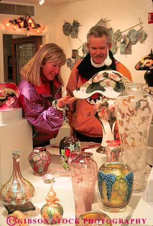 Stock Photo #11936: keywords -  art aspen chill chilly cold colorado couple customer customers destination downhill galleries gallery glass mountains released resort resorts rocky season shop shopper shoppers shopping ski snow travel vase vases vert winter