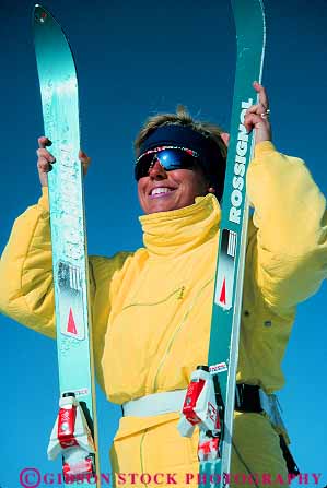 Stock Photo #11938: keywords -  aspen chill chilly clothes cold colorado colorful destination downhill female girl holding jacket mountains parka recreation released resort resorts rocky season ski skiers skies skiing snow sport sports stand standing suit travel vert winter woman