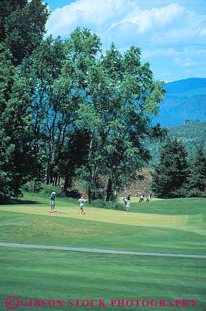 Stock Photo #12852: keywords -  aspen club colorado course destination golf golfers golfing grass historic lawn mountains outdoor outside recreation resort resorts rocky sport sports summer town towns travel vert west western