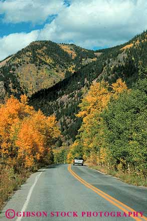 Stock Photo #12857: keywords -  aspen autumn car cars castle color colorado creek destination drive fall foliage historic mountains resort resorts road roads rocky street streets town towns travel vert west western