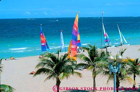 Stock Photo #11410: keywords -  beach beaches boat boats catamaran coast color colorful destination florida fort horz lauderdale ocean recreation resort sail sailboat sailboats sails sea shape shapes summer sunny travel triangle triangles tropical vacation warm