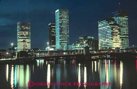 Stock Photo #7877: keywords -  america american architecture building buildings business center cities city cityscape cityscapes dark downtown dusk evening florida horz lighting lights modern new night office offices reflect reflecting reflection reflects skyline skylines tampa urban us usa water