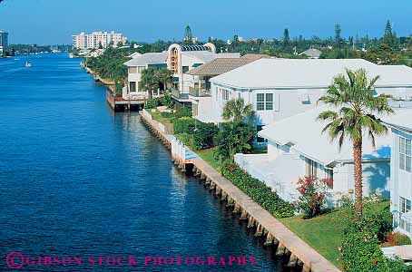 Stock Photo #11751: keywords -  (near beach beach) breakwall canal canals coast coastal destination florida home homes horz house houses in near neighborhood neighborhoods ocean palm resort resorts ridge seawall shore shoreline sunny travel vacation warm water waterfront
