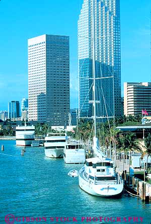 Stock Photo #11526: keywords -  bayside boat boats buildings cities city cityscape cityscapes dock docks downtown florida harbor harbors marina marinas marketplace miami skyline skylines urban vert water yacht yachts