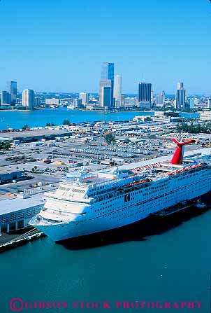 Stock Photo #11527: keywords -  aerial aerials boat boats buildings cities city cityscape cityscapes cruise downtown florida harbor harbors in miami of port ports ship ships skyline skylines urban vert