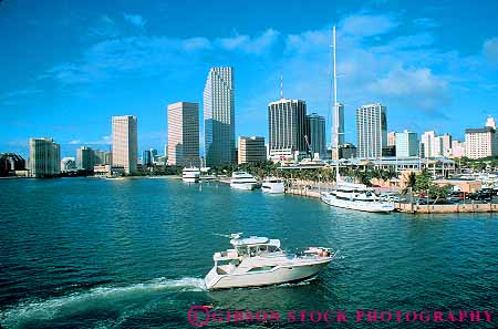 Stock Photo #11531: keywords -  bayside boat boats buildings cabin cities city cityscape cityscapes cruise downtown florida horz marina marketplace miami moving near recreation skyline skylines urban yacht yachts