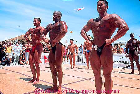 Stock Photo #11497: keywords -  aerobics and annual beach body bodybuilder builders building competing competition competitors conditioning contest contestants demonstrate demonstrators destination develop developed development display displaying displays event exercise fair fairs festival festivals fitness flex flexing florida horz human man men miami muscle muscles muscular outdoor outside physical resort sex sexy skin sport sports sunny sunshine tan tanned training travel tropical vacation workout