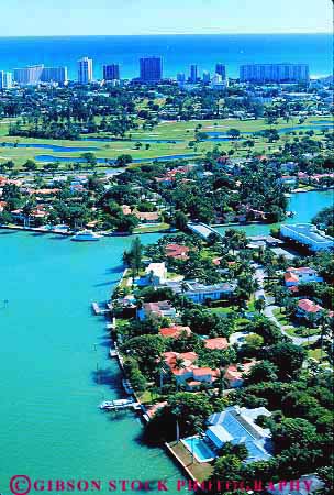 Stock Photo #11502: keywords - aerial aerials beach canal destination florida homes houses miami neighborhood neighborhoods residential resort shore shoreline travel tropical vacation vert