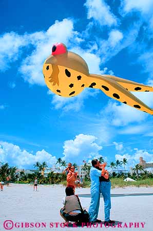 Stock Photo #11511: keywords -  aerodynamic aerodynamics air beach destination fair fairs festival festivals flight florida fly flying fun international kite kites lift lifting miami people play resort travel tropical vacation vert wind
