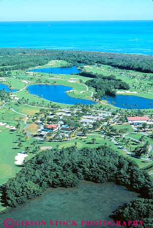 Stock Photo #11560: keywords -  aerial aerials biscayne coast course courses florida golf golfing key miami ocean shore vert