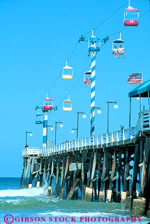 Stock Photo #12867: keywords -  beach beaches coast coastal daytona destination dock elevate elevated florida gondola gondolas leisure ocean pier piers recreation resort resorts ride shore shoreline south sunny sunshine surf travel vacation vert water with