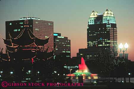 Stock Photo #8291: keywords -  building buildings colored dark destination dusk eola evening florida fountain high horz lake lighting lights modern night office orlando rise sunset travel usa vacation