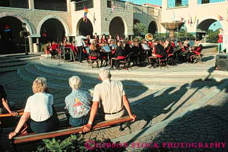 Stock Photo #8299: keywords -  audience band destination entertain entertaining entertainment entertains florida horz listen listening listens mercado music musical musician musicians orlando outdoor outside people perform performance performing public show sound travel usa vacation village