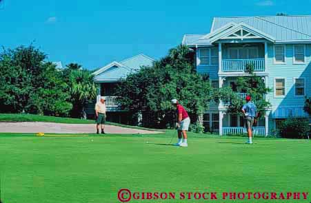 Stock Photo #8313: keywords -  activities activity amusement buena course destination disneyworld florida fun game games golf golfer golfers golfing green horz lake lawn leisure men orlando play playing recreation resort resorts sport travel usa vacation vista