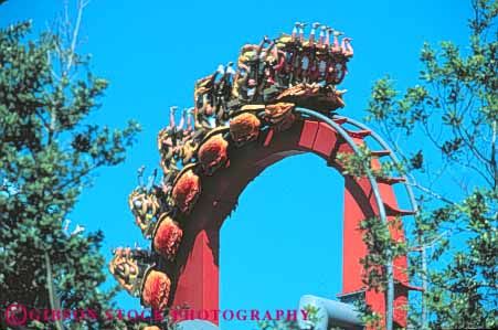 Stock Photo #8335: keywords -  activities activity adventure amusement attraction destination down dragons dueling families family florida fun group horz inverted islands leisure of orlando park people play resort resorts ride riders rollercoaster rollercoasters scare scary scream screaming side studios thrill tourist travel universal up usa vacation