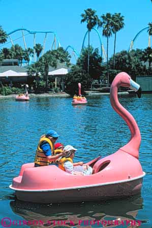 Stock Photo #8348: keywords -  activities activity amusement attraction boat boating destination families family flamingo florida fun lake leisure orlando paddle park people pink plastic play pond rent rental rents resort resorts ride sea synthetic tourist travel usa vacation vert water world