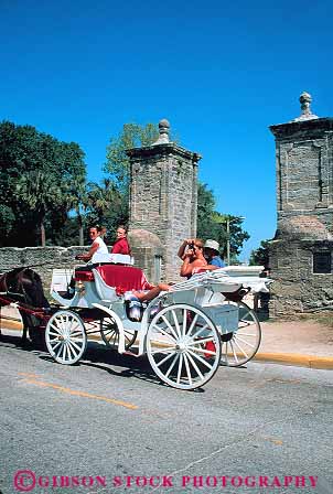 Stock Photo #13937: keywords -  american attraction augustine camera carriage carriages city couple couples florida gates historic history horse old people photo photography picture saint sightsee sightseeing site sites south southern spanish st st. taking tour touring tourist tourists tours travel vacation vert wheel wheels