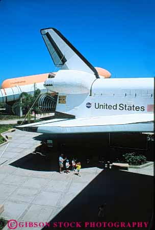 Stock Photo #9808: keywords -  center contrast contrasting difference different display displays equipment exhibit exhibits exploration explore family florida hardware kennedy museum museums near outdoor outside people replica rocket rockets shuttle size space vert walks