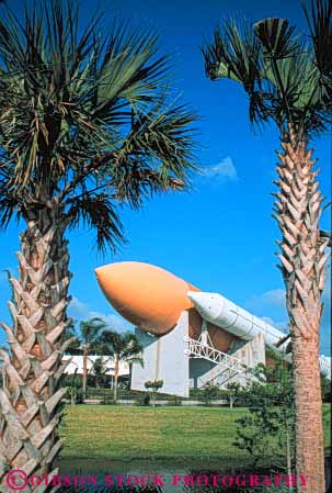 Stock Photo #9809: keywords -  booster center display displays equipment exhibit exhibits exploration explore florida hardware kennedy museum museums outdoor outside palm rocket rockets shuttle space tree trees vert