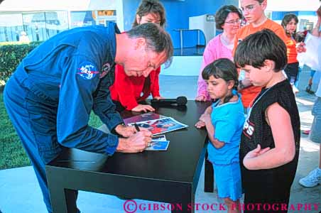 Stock Photo #9817: keywords -  astronaut astronauts autographed autographing autographs boy boys celebrity center display displays equipment exhibit exhibits exploration explore florida hardware horz idol kennedy museum museums outdoor outside photo rick rocket rockets searfoss sign signature signatures signs singing souvenir souvenirs space