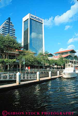 Stock Photo #7518: keywords -  america american architecture boat boatcs building buildings business center cities city cityscape cityscapes downtown florida jacksonville johns modern new office river riverfront riverwalk skyline skylines st urban usa vert