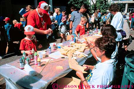 Stock Photo #12155: keywords - activity animals annual boy boys celebrate celebrates celebration child children craft crafts day earth event fair fairs festival festivals florida group groups horz jacksonville landing make people toy