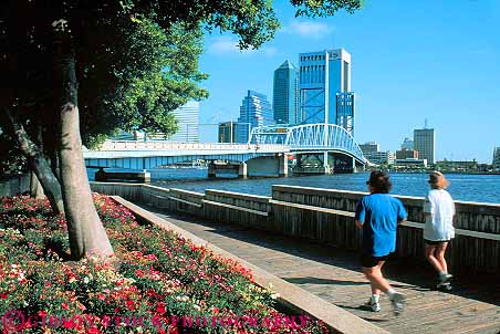 Stock Photo #12174: keywords -  along athletic cities city cityscape cityscapes downtown exercise exercising fitness florida friend friends friendship health healthy horz jacksonville jog jogger joggers jogging jogs johns leisure leisurely pair river rivers run runner runners running runs season skyline skylines st summer two urban warm woman women workout